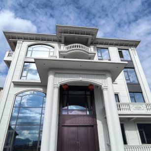 四川白麻别墅外墙干挂石材效果示例