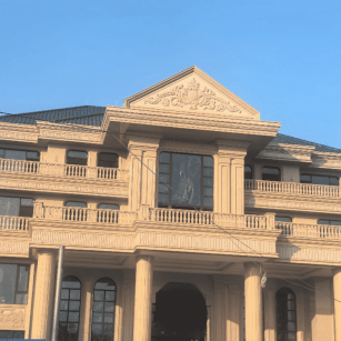 四川黄金麻别墅外墙干挂石材效果示例