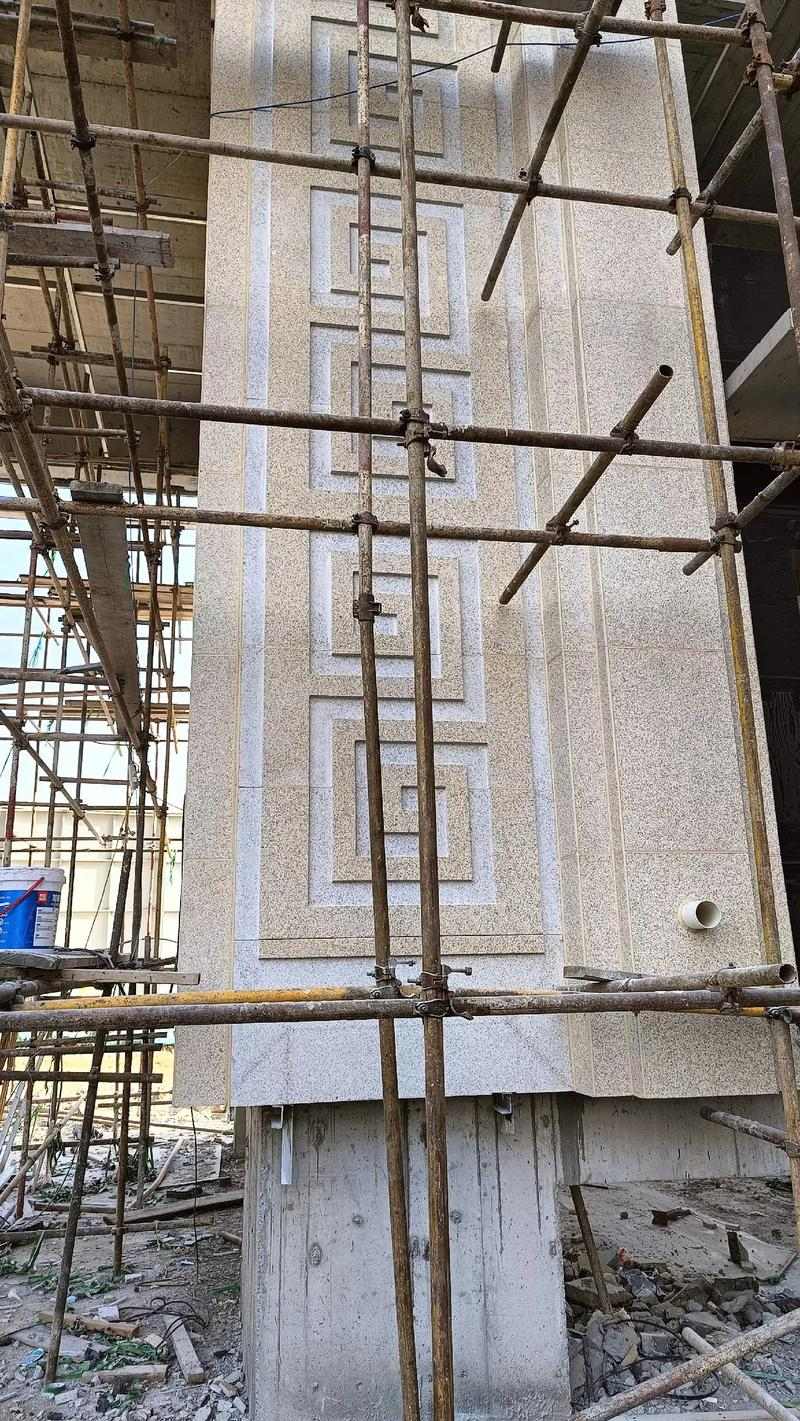 四川 黄金麻花岗岩别墅外墙干挂回纹造型效果