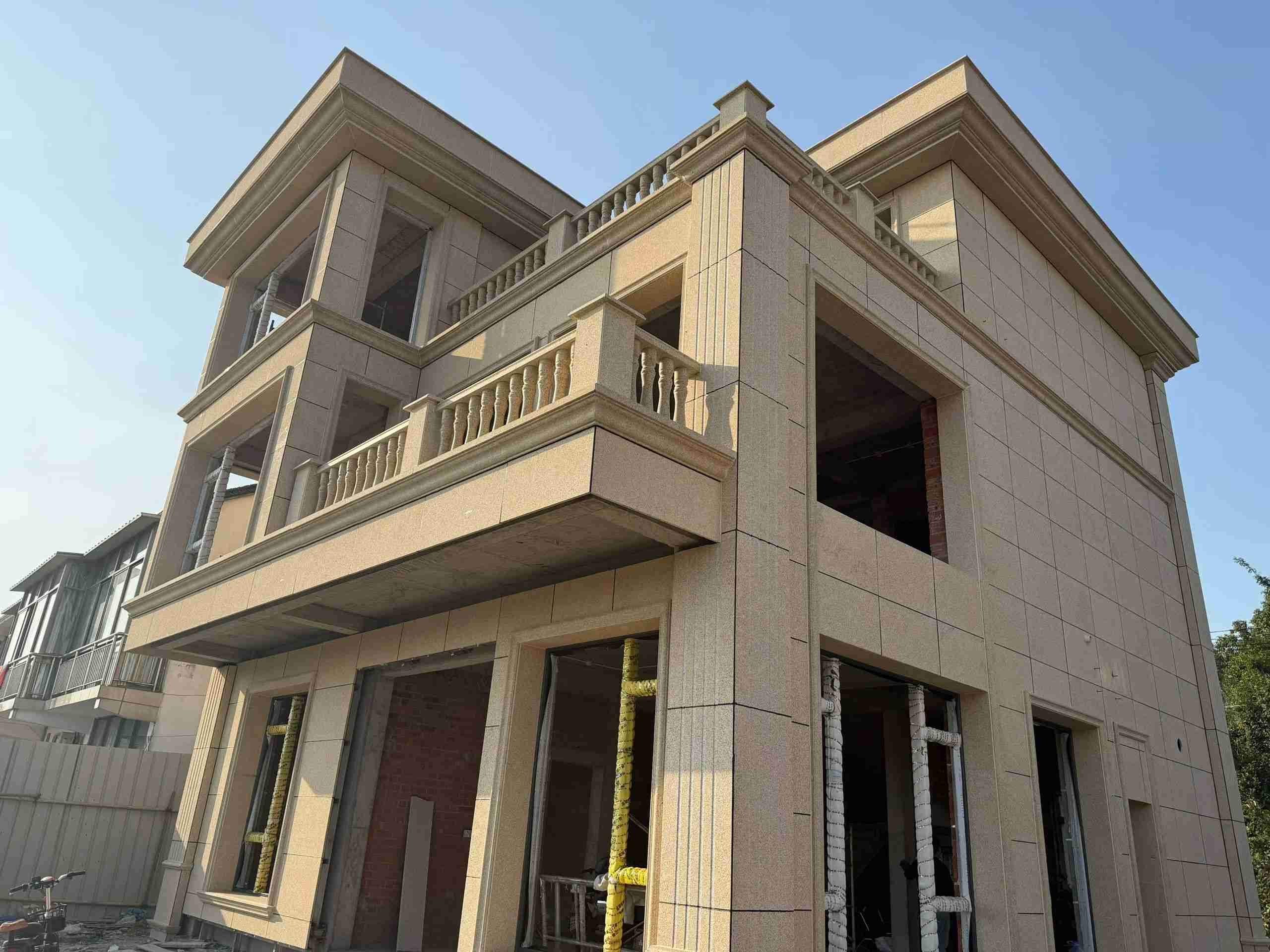 四川 黄金麻花岗岩石材荔枝面外墙干挂效果展示